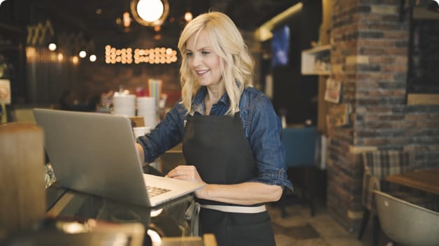 A waitress on computer