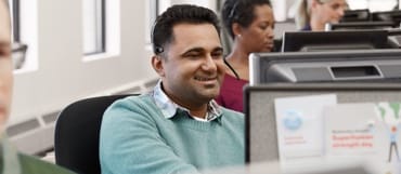 Happy man while working