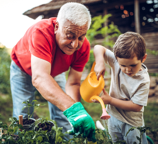 A man and child gardening