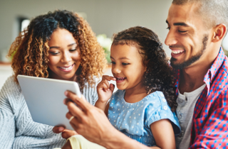 A family using at&t internet on their tablet