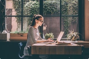 Woman using AT&T Fiber