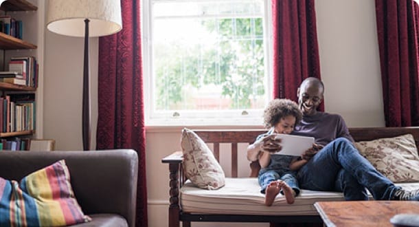 Father a child using a tablet