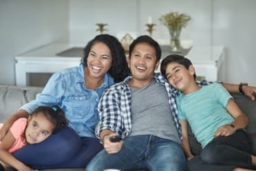 family watches TV