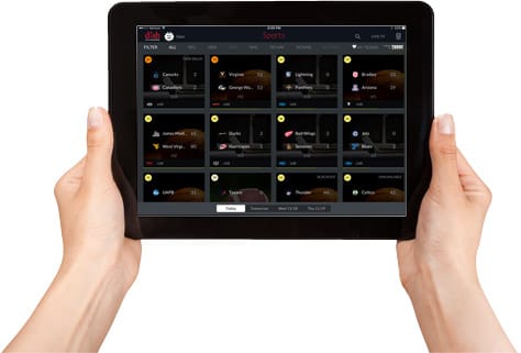 A pair of hands holds up a tablet displaying the DISH Anywhere App