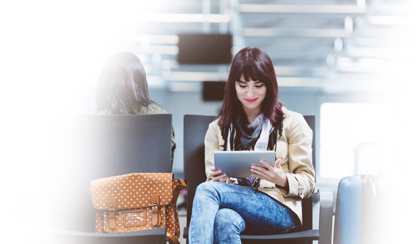 woman reading tablet