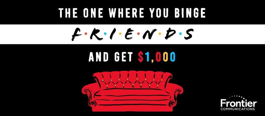 Friends red couch with promotion above it to win $1000.