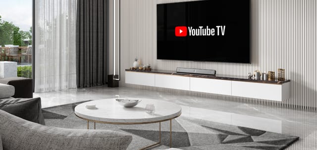 YouTube TV logo on a TV screen in a living room