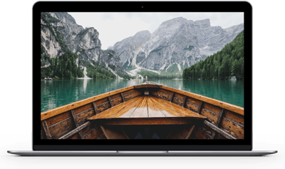 A laptop depicting a canoe on an aquamarine mountain lake