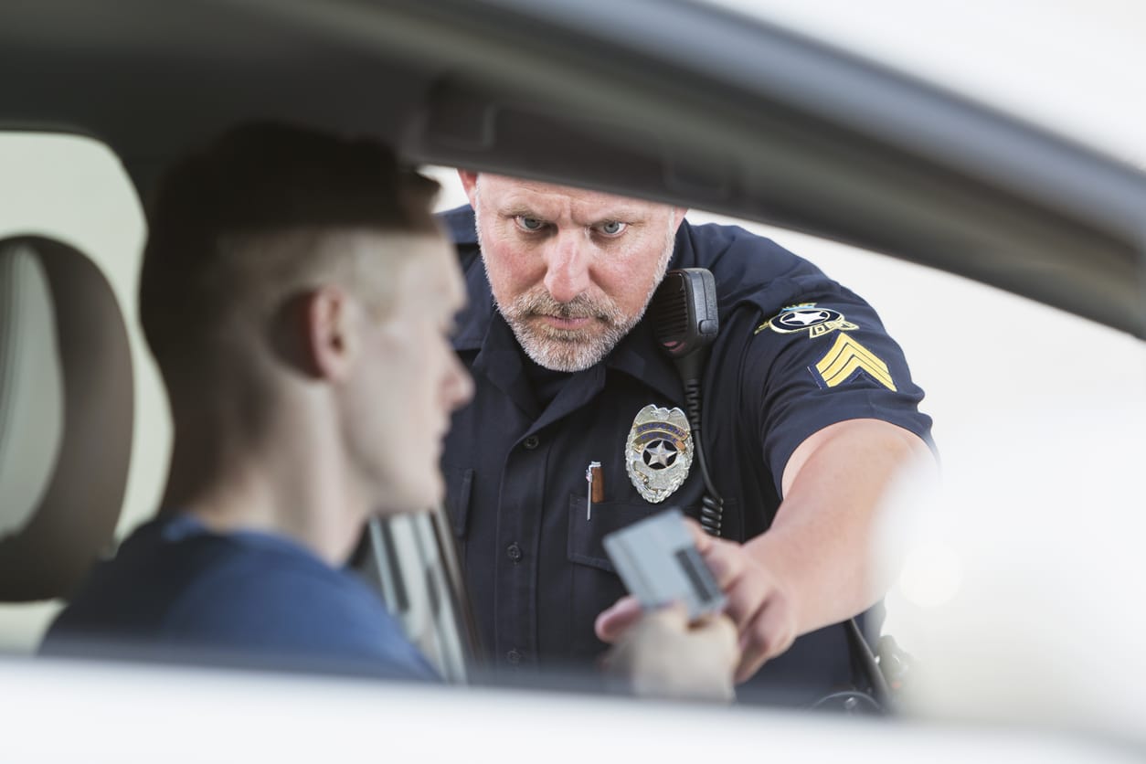 police reaching for drivers license