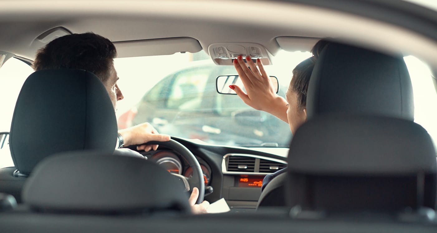 people riding in a car