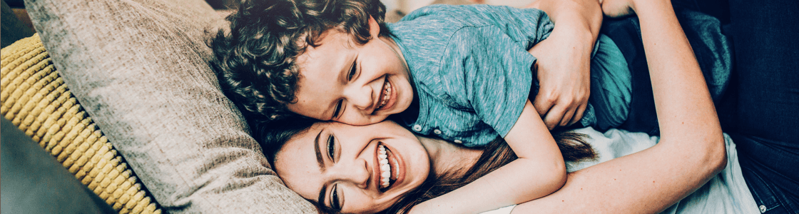 woman and child laughing