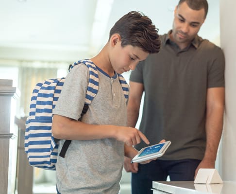 Boy using the keypad