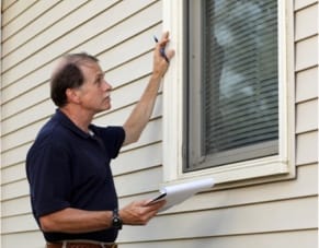 ADT technician inspects home