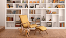 Home library bookshelf with lounge chair in front